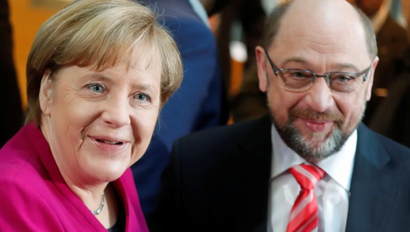 Allemagne: au bout de la nuit, Merkel et le SPD s'accordent sur un projet